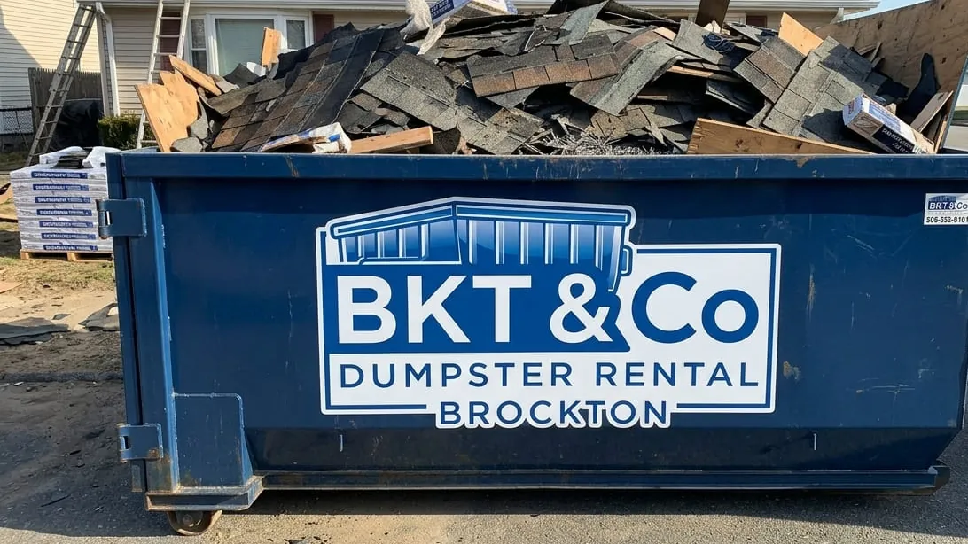 Roofing tear-off dumpster in Brockton, Massachusetts — container sized by squares and layers for asphalt shingle